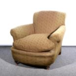 Edwardian easychair, scroll back and arms, bowfront seat, turned and ringed stained wood legs,