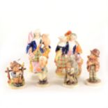 A small collection of nine Hummel figures, three Staffordshire flat-back figures...