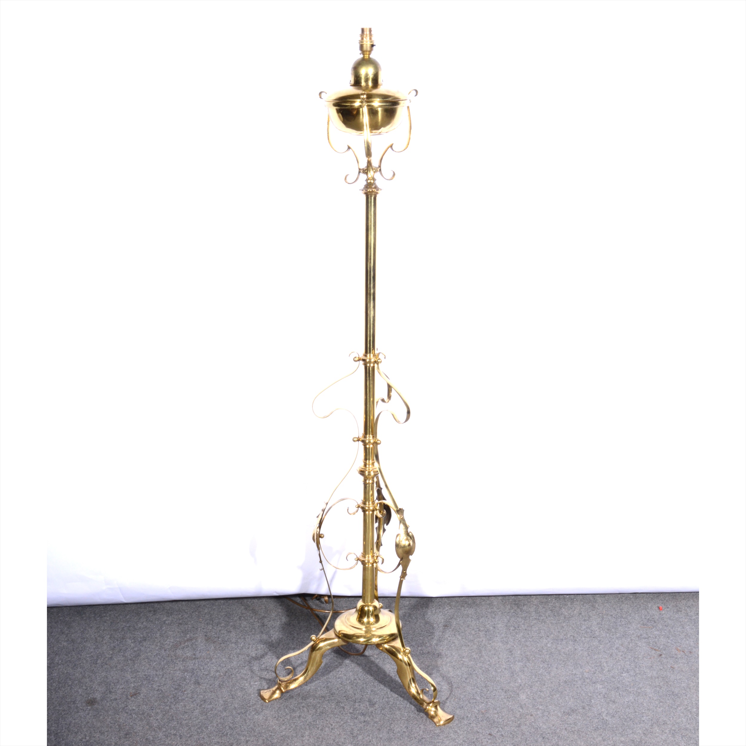 An English Art Nouveau brass standard lamp, converted.