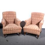 A near pair of Edwardian easy chairs, ...