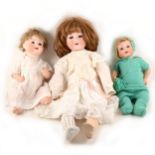 Three bisque head dolls, an Armand Marseille, Heubach Koppelsdort and an American.