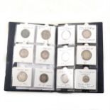 An album of 12 milled coins, from George II 1745 to George VI 1937,