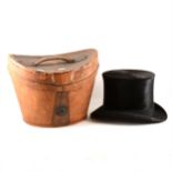 Black silk top hat, leather case.