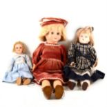 Three dolls, including a French paper-mache doll, and two composition dolls.