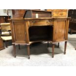 Edwardian mahogany serpentine sideboard,