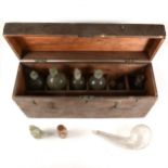 Glass chemists bottles, in a wooden case.