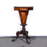 A Victorian walnut trumpet work table,
