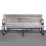 A slatted wooden garden bench,