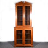 A late Victorian inlaid mahogany free-standing corner cupboard,