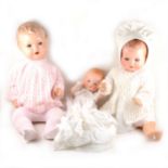 Three Armand Marseille 'Dream Baby' dolls, two with composition heads, fixed eyes and open mouths,