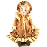 A German bisque head doll, leather body, sleeping eyes, open mouth, 56cm