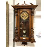 A walnut and beech Vienna style wall clock,