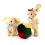 Two Steiff Germany rabbit teddies and a ball.