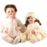Two German JDK Ketsner bisque head baby dolls, a boy and girl, composition bodies, fixed eyes, open