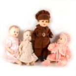 Three early plastic dolls and a bisque head doll, including an Armand Marseille 996 head stamp with