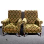Two Edwardian easy chairs, scroll back and arms, bowfront seat, short cabriole legs, loose covers,