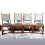 A set of four walnut dining chairs,