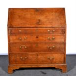 A George III oak bureau,