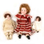Three bisque head dolls, including two Armand Marseille with 390 head stamps, 22cm, and 42cm, and