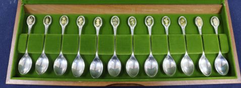 A cased set of twelve Royal Horticultural Society parcel gilt silver spoons, John Pinches, 1968/73/