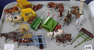 A collection of mostly Britains horses and carts, ploughs, etc.