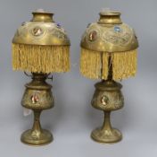 A pair of Arts and Crafts brass oil lamps height 40cm (one a.f.)