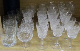 A part suite of Waterford cut glass tableware, two similar Royal Doulton brandy balloons and five