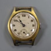 A gentleman's mid size gilt metal and steel Rolco manual wind wrist watch, no strap.