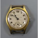 A gentleman's mid size gilt metal and steel Rolco manual wind wrist watch, no strap.
