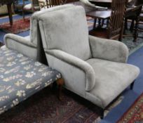 A pair of Howard-style armchairs