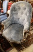 A Victorian spoonback armchair