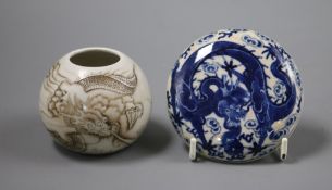 A Chinese miniature water pot and a jar cover
