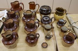 A large collection of 19th century stoneware harvest jugs, etc.