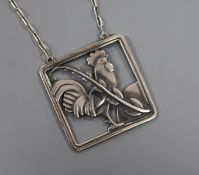 A Danish Georg Jensen sterling silver square cockerel pendant, no. 96, 39mm, on a white metal