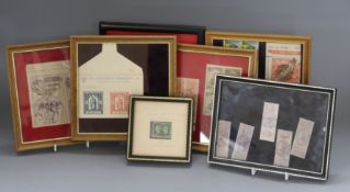 A small collection of framed decorative postage stamps, including 5 Queen Victoria lilac Fiscal/