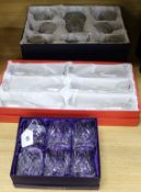 Three box sets of crystal glass ware including brandy glasses, champagne flutes and tumblers