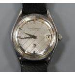 A gentleman's stainless steel Girard Perregaux Gyromatic wrist watch, on associated leather strap.