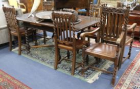 An oak draw-leaf dining table and 6 chairs W.182cm