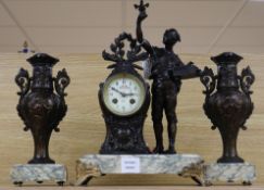 A late 19th century French bronzed spelter figural three piece clock garniture, on marble plinths