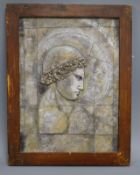 A framed relief panel 39 x 29cm
