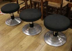 Three chrome and aluminium stools