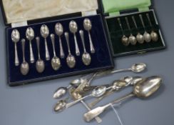 Two incomplete cased sets of silver teaspoons, eleven other silver teaspoons and a Georgian silver