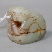 A Chinese jade figure of a crouching boy 4.5cm.