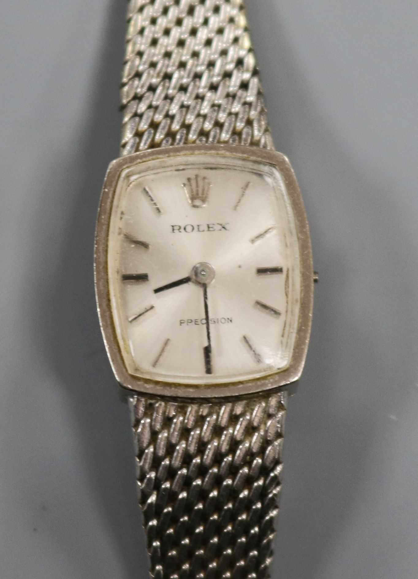 A lady's 9ct white gold Rolex Precision manual wind wrist watch, on a 9ct white gold bracelet (no