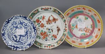 Three 18th century Chinese plates, famille rose, famille verte and blue and white