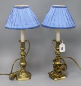 Three gilt metal lustre shades and a pair of brass candlestick lamps