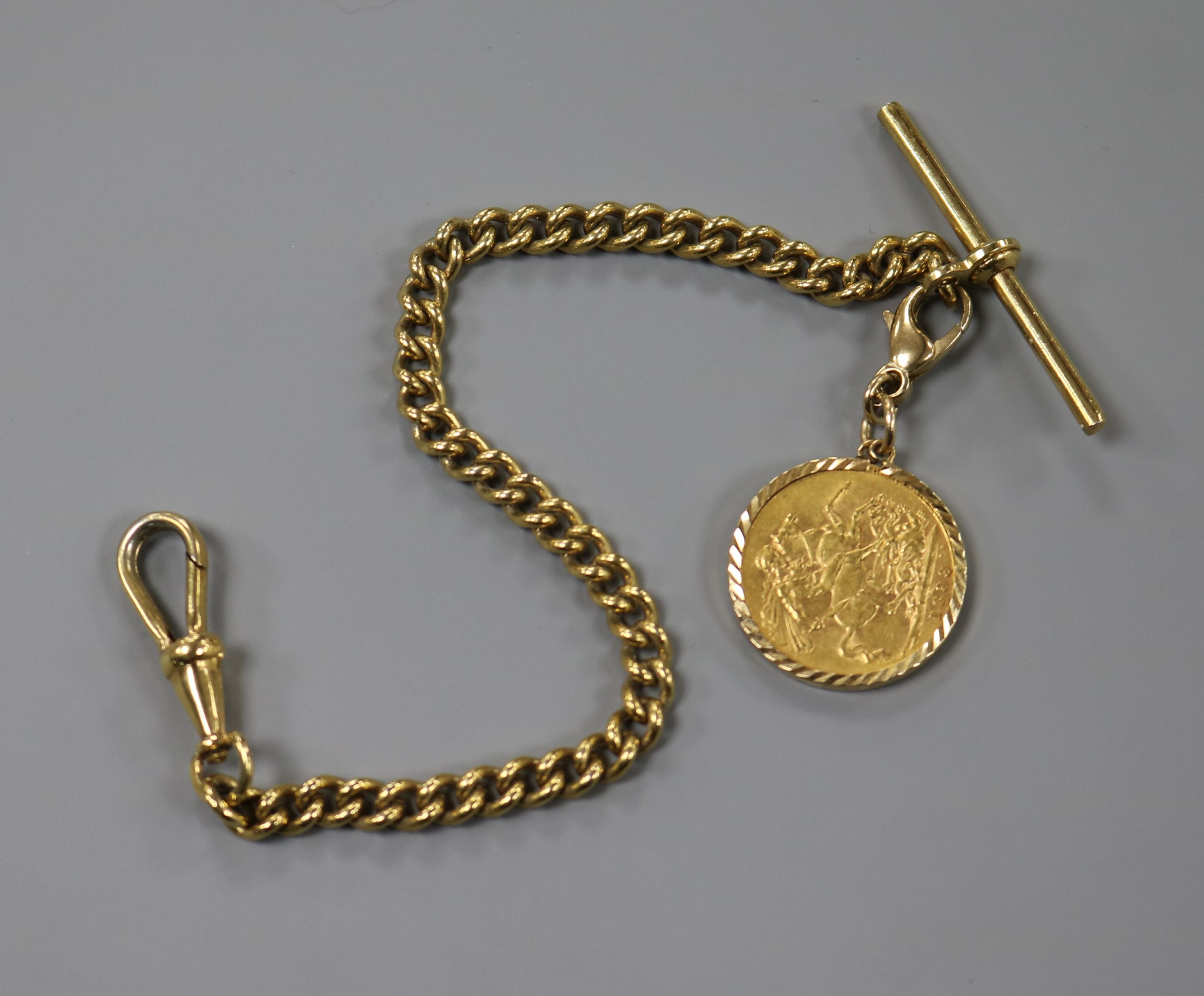 An 1893 gold sovereign in 9ct gold mount with trigger clasp (10.1g total) on a gilt metal metal
