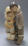 A large Lladro boy and girl Eskimo child group height 38.5cm