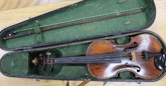 A 19th century violin, two piece back, cased with a later bow