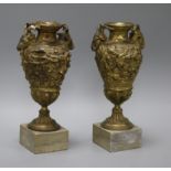 A pair of 19th century bronze vases, grey marble plinths height 23.5cm